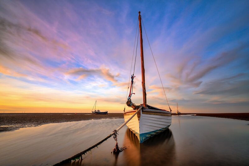 Sailboat on Beach — Blue, Serene, Sunset, Photograph, Boats