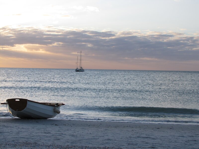 Sailboat on Beach — Blue, Serene, Sunset