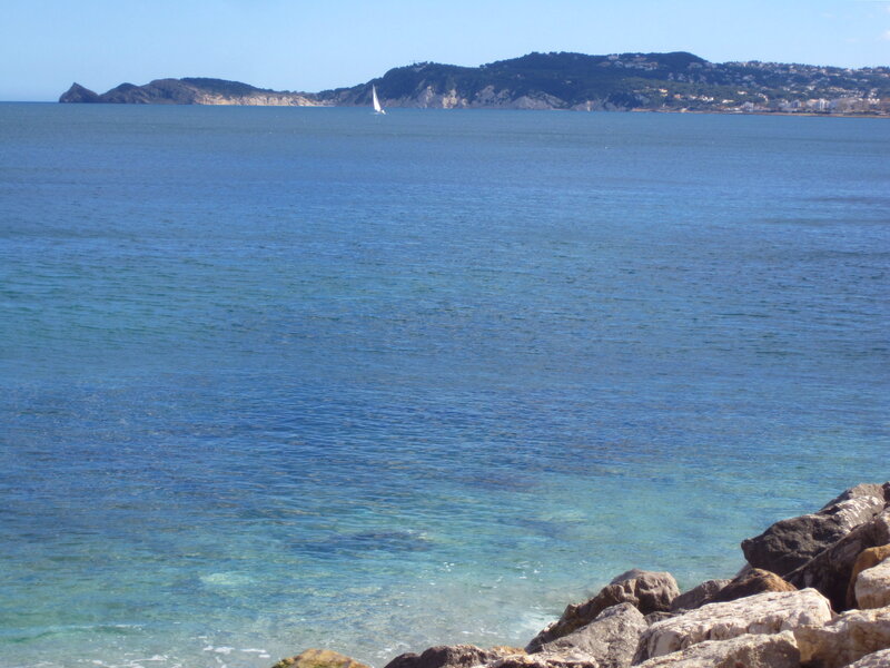 Sailboat on Blue Sea — Serene, Afternoon, Photograph