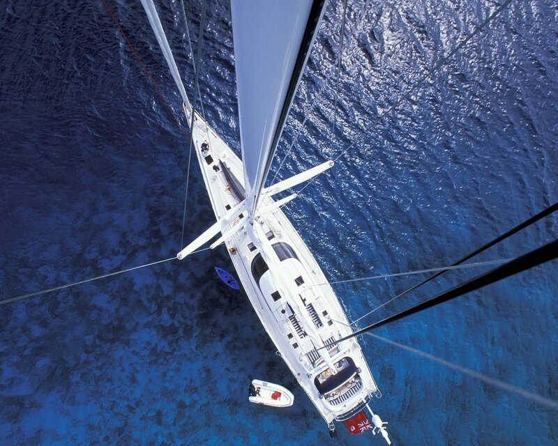 Sailboat on Blue Water — Serene