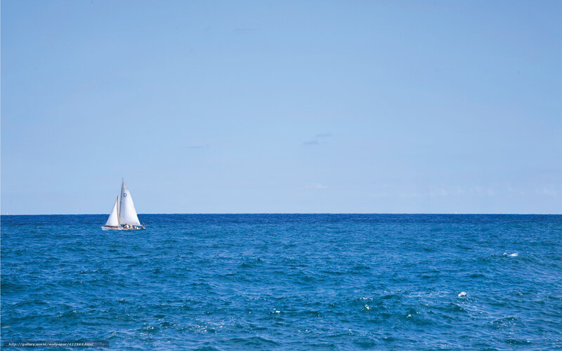 Sailboat on calm blue sea