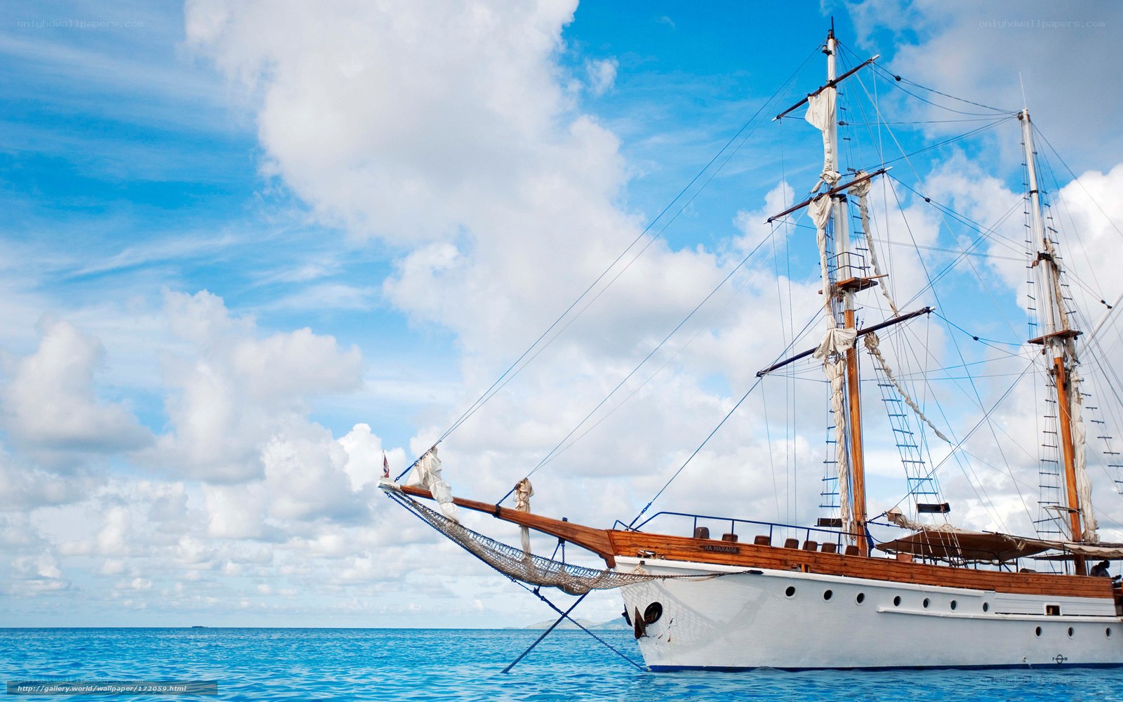 Sailboat on calm blue sea
