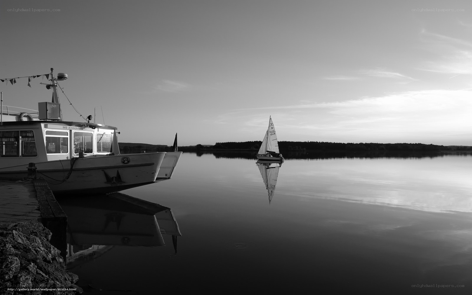 Sailboat on calm lake