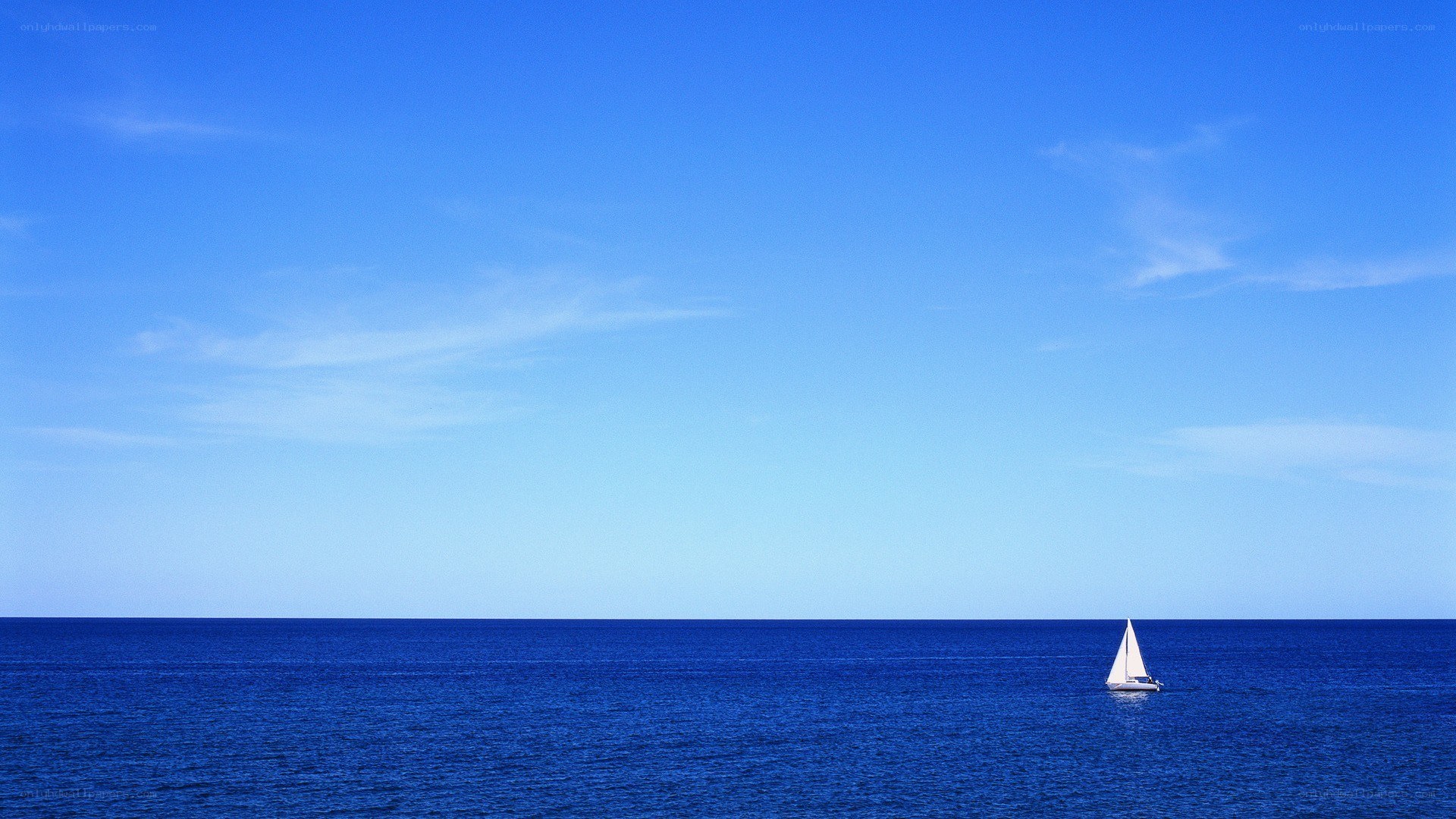sailboat on calm ocean