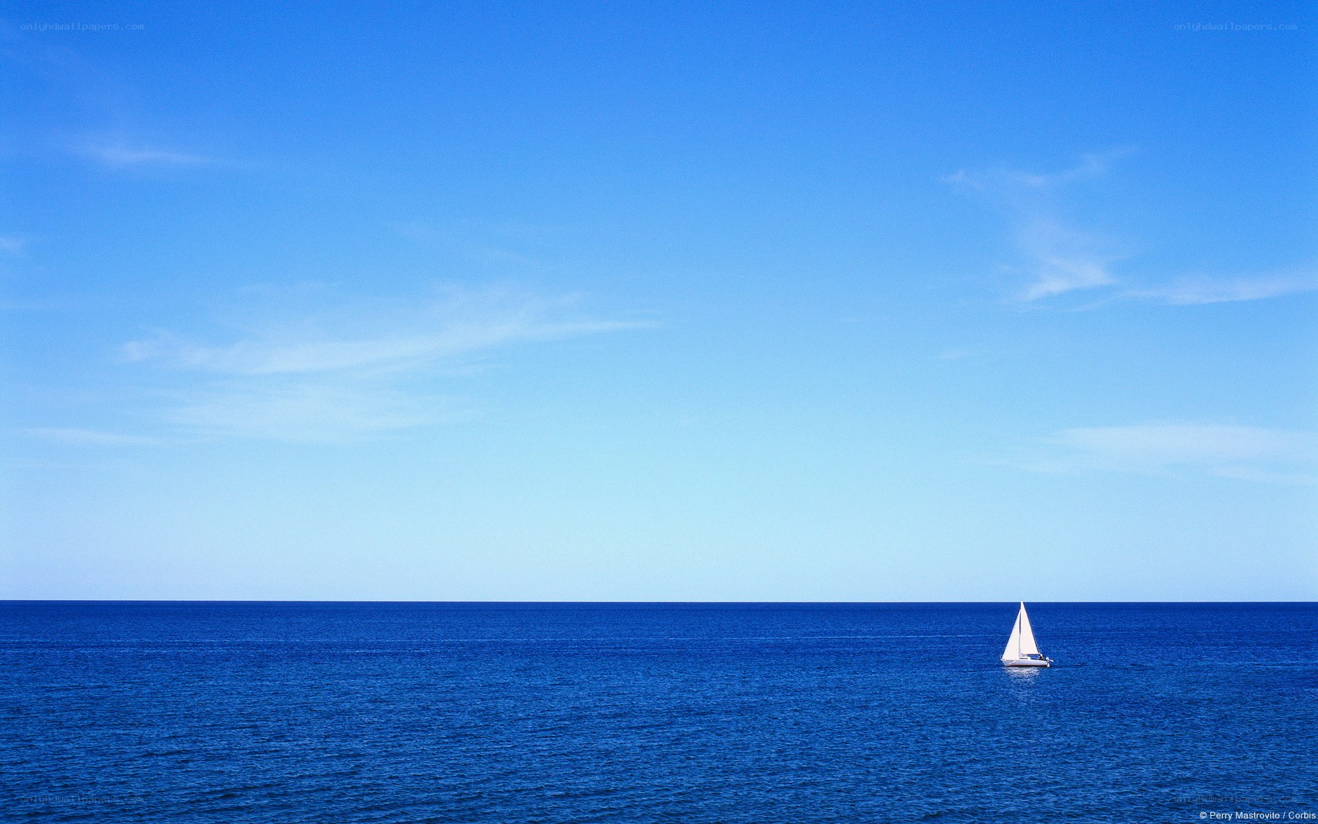 Sailboat on calm ocean