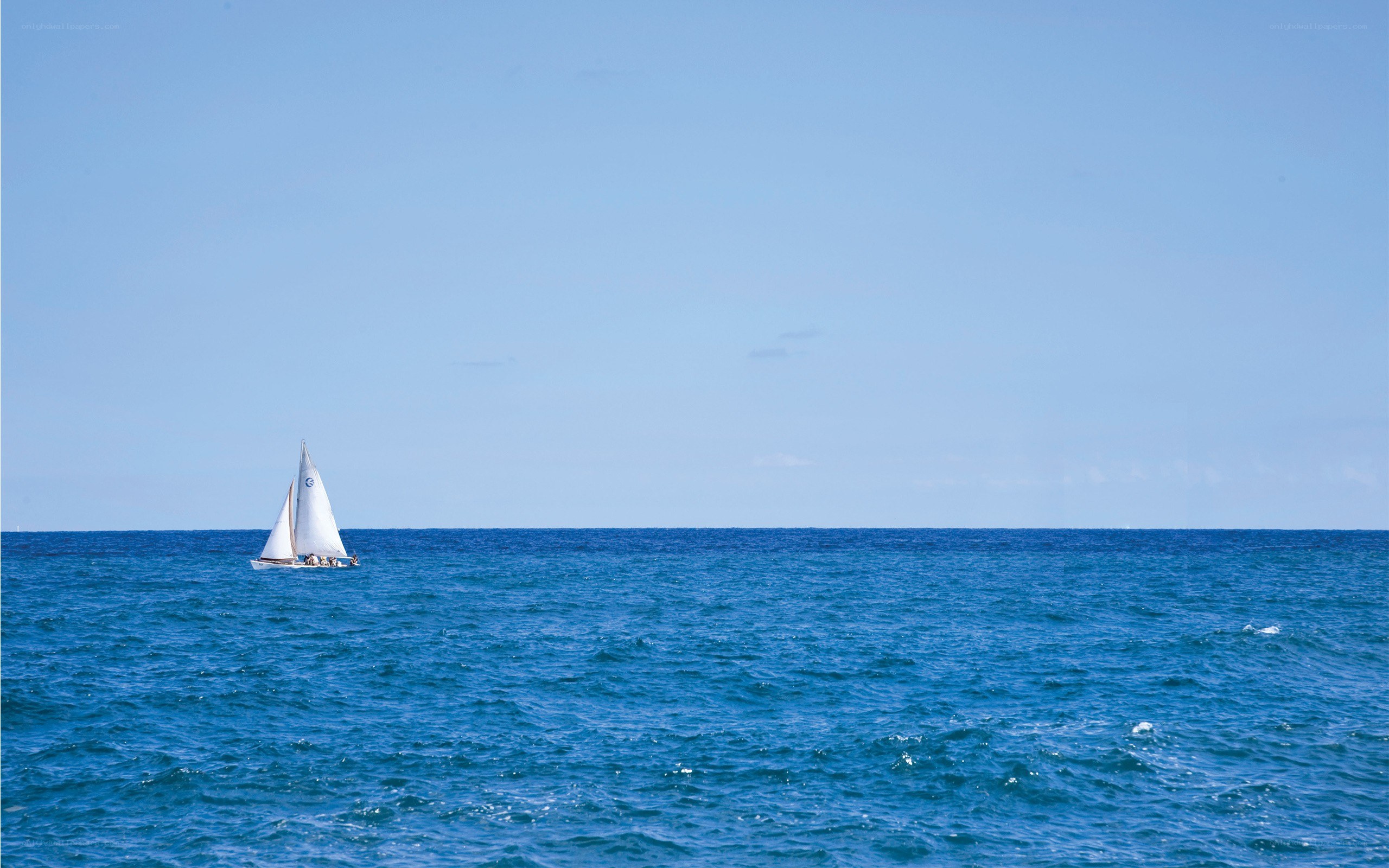 Sailboat on calm ocean