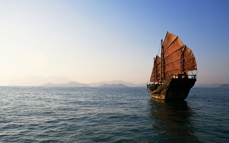 sailboat on calm sea