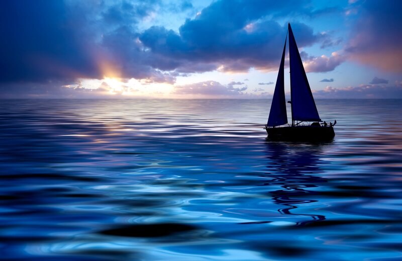 Sailboat on Calm Sea — Blue, Serene, Sunset, Photograph