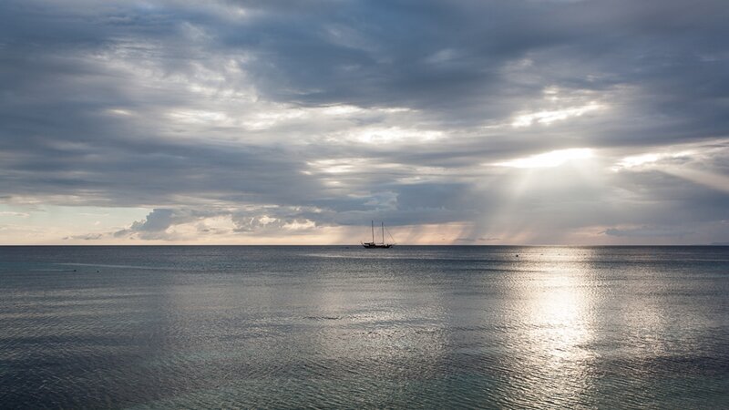 Sailboat on Calm Sea — Gray, Serene