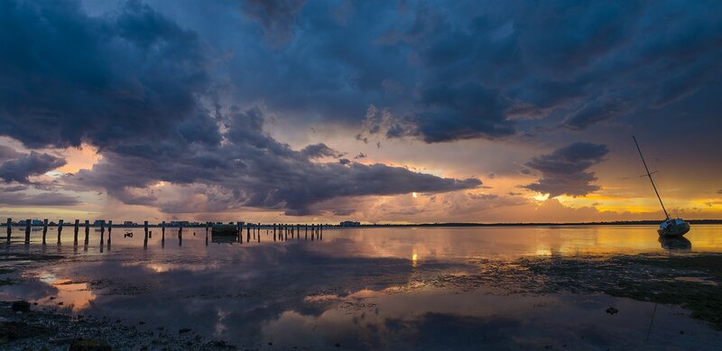 Sailboat on Calm Water — Blue, Dramatic, Sunset, Photograph, Clouds