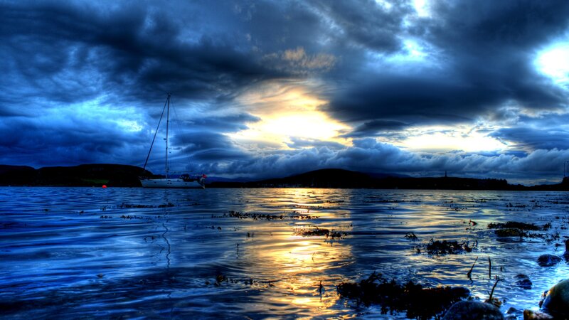 Sailboat on Calm Water — Blue, Dramatic, Sunset