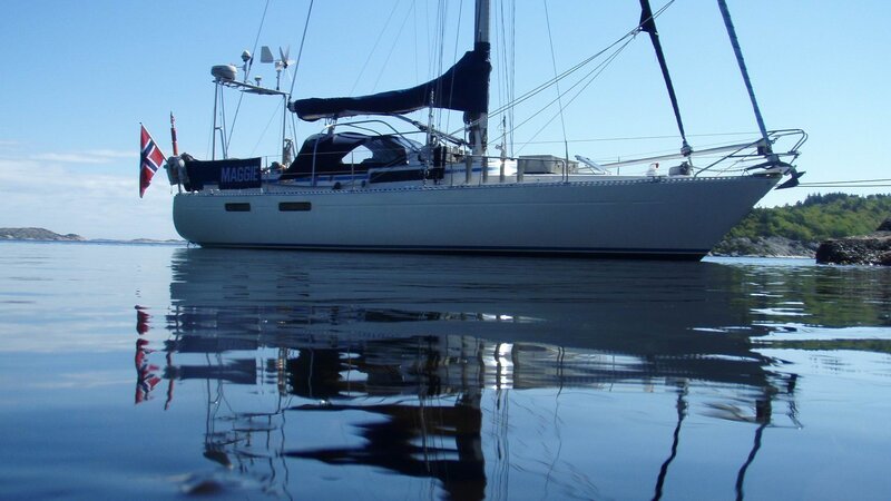 Sailboat on Calm Water — Blue, Serene, Afternoon, Photograph, Flag