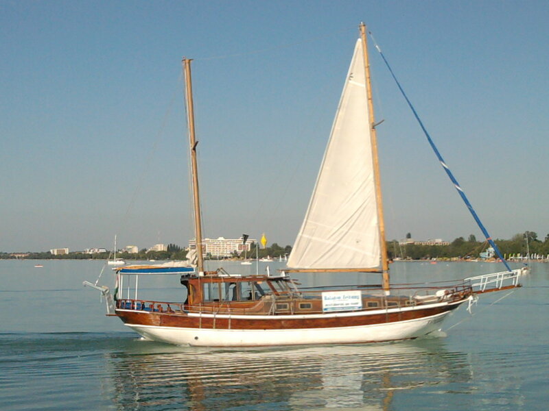 Sailboat on Calm Water — Blue, Serene, Afternoon, Photograph, Sail, Mast