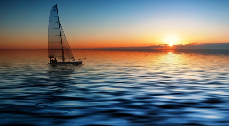 Sailboat on Calm Water — Blue, Serene, Sunset, Photograph, Sun, Sky, People