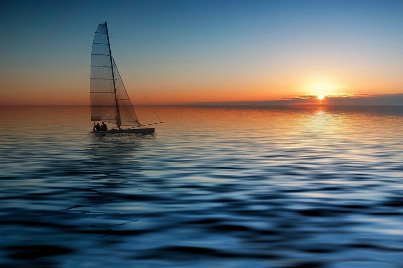 Sailboat on Calm Water — Blue, Serene, Sunset, Photograph, Sun, Sky