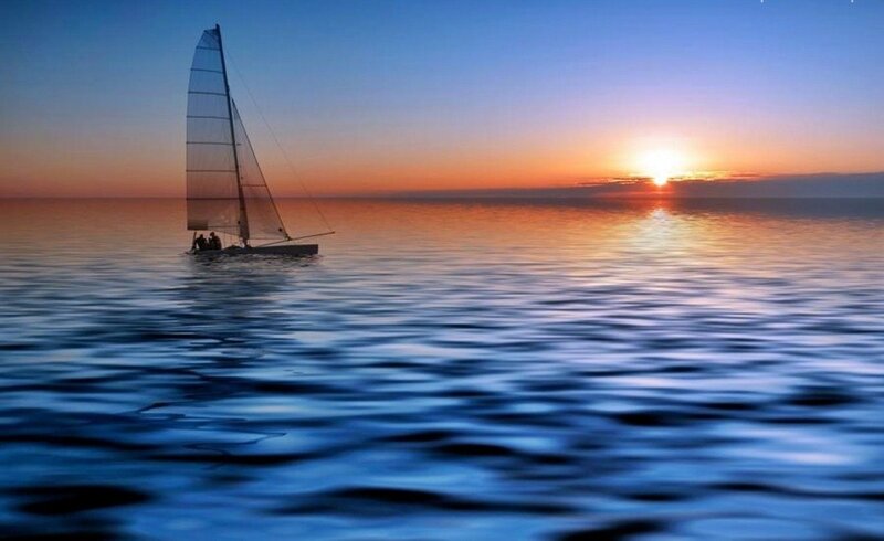 Sailboat on Calm Water — Blue, Serene, Sunset, Photograph, Sun