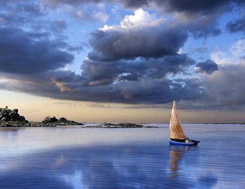 Sailboat on Calm Water — Blue, Serene, Sunset