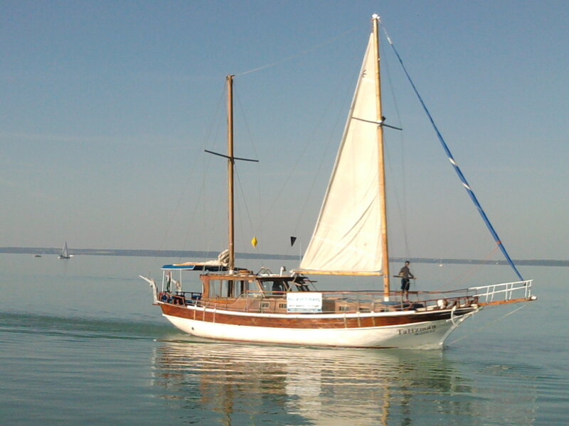 Sailboat on Calm Water — Blue, Serene