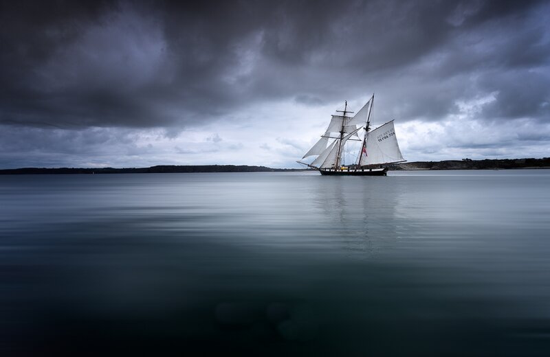 Sailboat on Calm Water — Gray