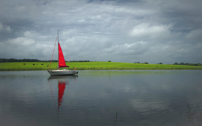 Sailboat on Calm Water — Green, Afternoon