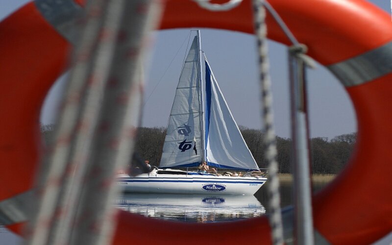 Sailboat on Calm Water — Red, Afternoon