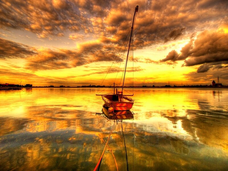 Sailboat on Calm Water — Yellow