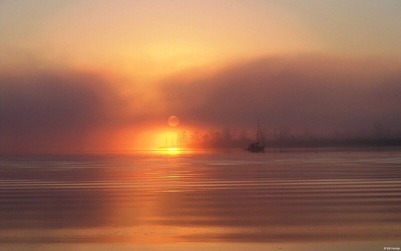 Sailboat on Foggy Water