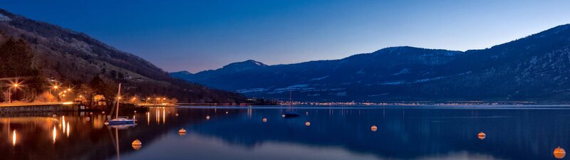 Sailboat on Lake at Dusk — Blue, Serene, Night, Photograph