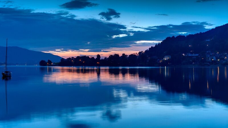 Sailboat on Lake at Dusk — Blue, Serene, Sunset