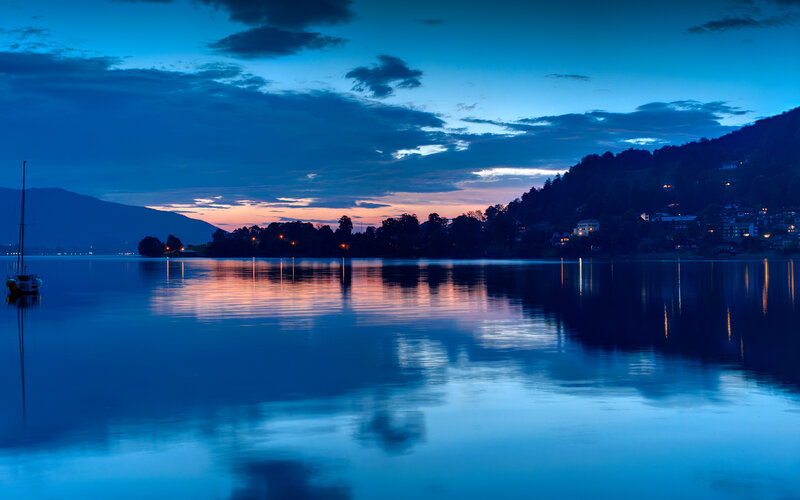 Sailboat on Lake at Dusk