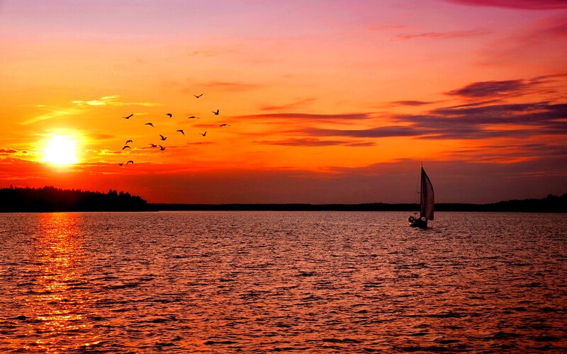 Sailboat on Lake at Sunset — Orange, Serene