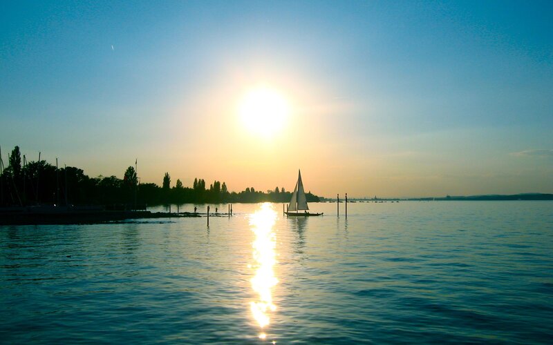 Sailboat on Lake at Sunset