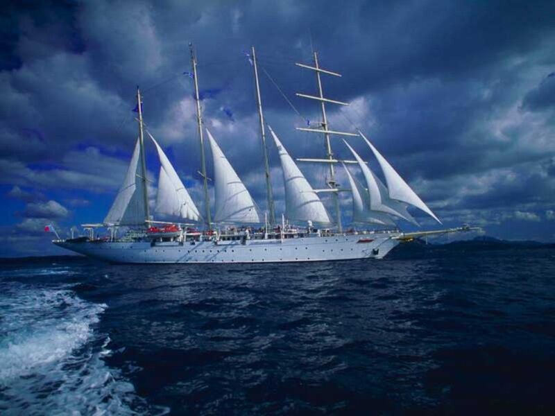 Sailboat on Ocean — Blue, Dramatic, Photograph