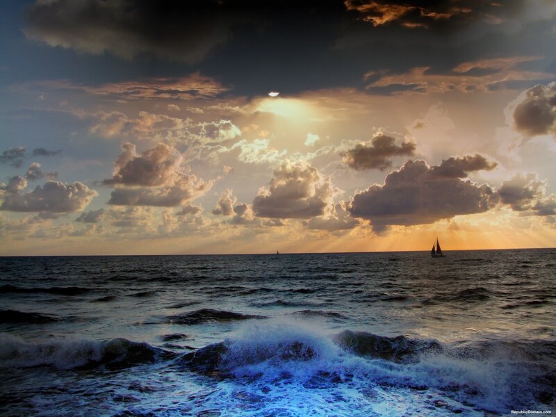 Sailboat on Ocean — Blue, Dramatic, Sunset, Photograph, Clouds, Sun