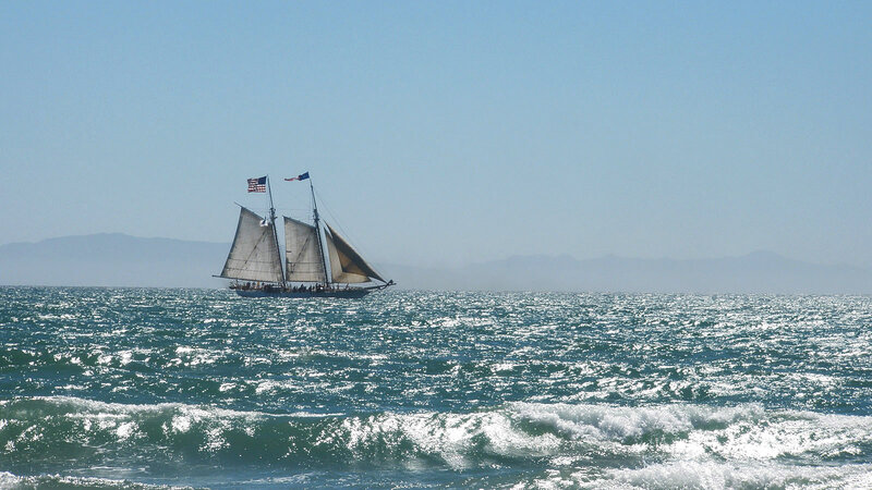 Sailboat on Ocean — Blue, Serene, Afternoon, Photograph, Flag