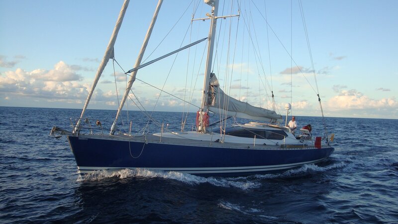 Sailboat on Ocean — Blue, Serene, Afternoon, Photograph, People