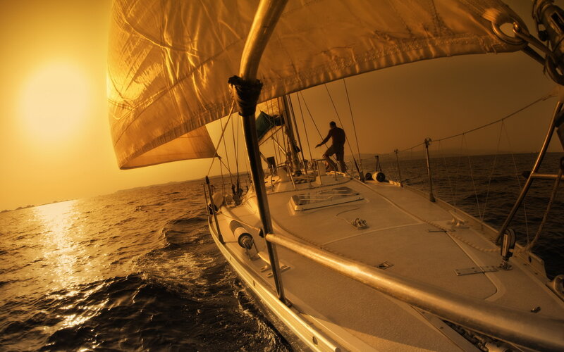 Sailboat on Ocean — Gold, Dramatic, Sunset, Photograph