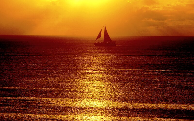 Sailboat on Ocean — Orange, Dramatic, Sunset, Photograph