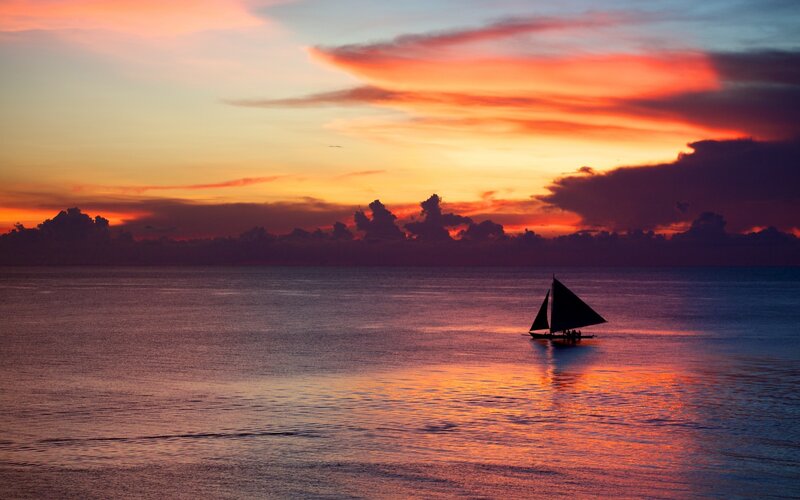 Sailboat on Ocean — Orange, Serene, Sunset, Photograph, Clouds