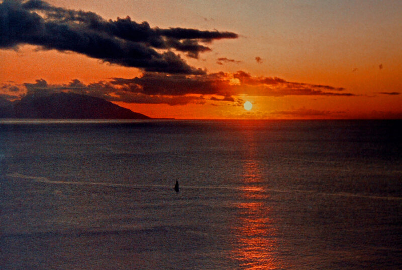 Sailboat on Ocean — Orange, Serene, Sunset, Photograph, Sun, Clouds