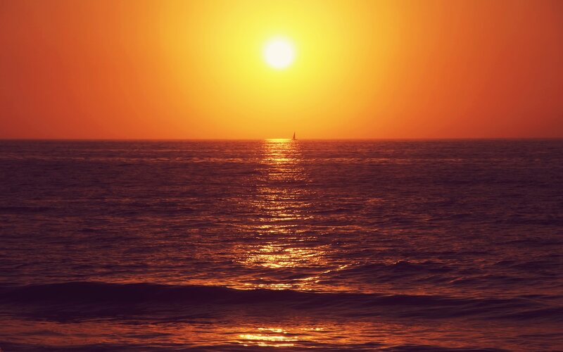 Sailboat on Ocean — Orange, Serene, Sunset, Photograph, Sun, Yellow
