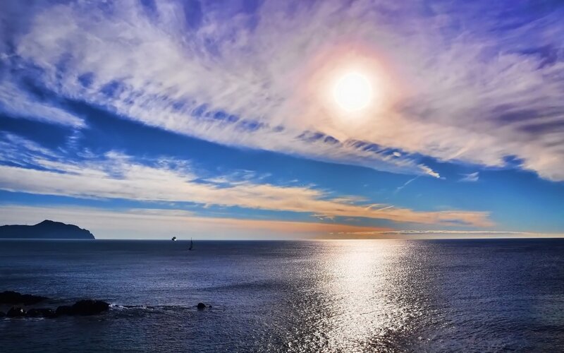 Sailboat on Ocean — Sun