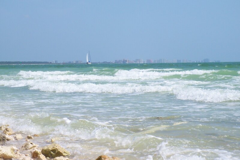 Sailboat on Ocean Waves — Blue