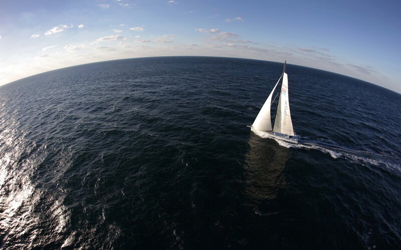 Sailboat on Open Ocean — Blue