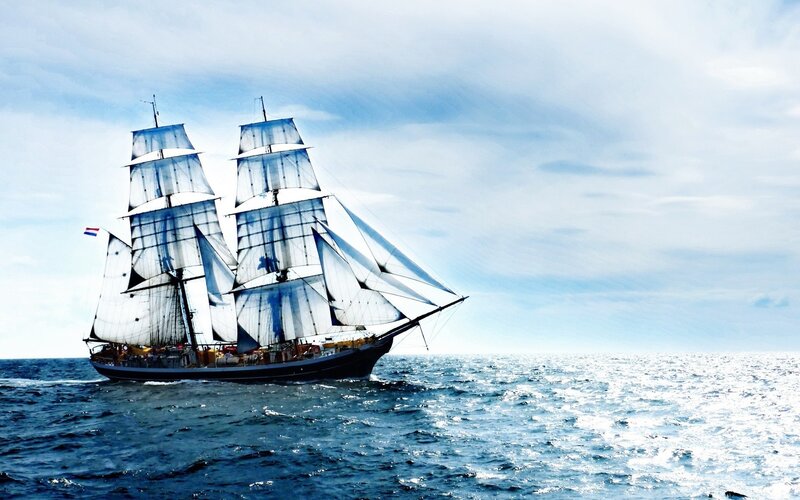 Sailboat on Open Sea — Blue, Serene, Afternoon, Photograph, Sails, Ocean