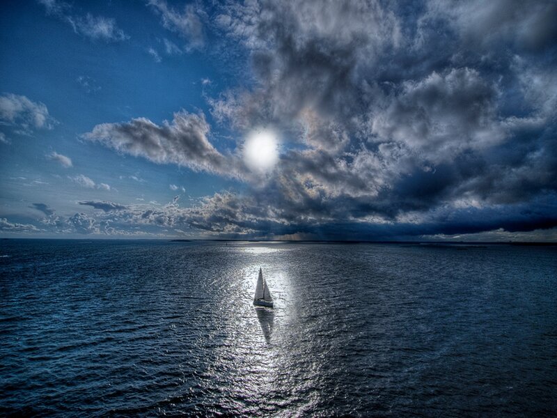 Sailboat on Open Water — Blue, Dramatic