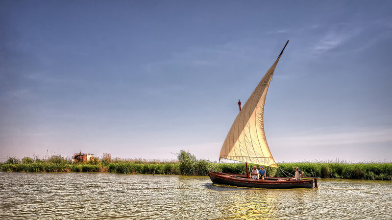 Sailboat on River — Blue, Serene, Afternoon