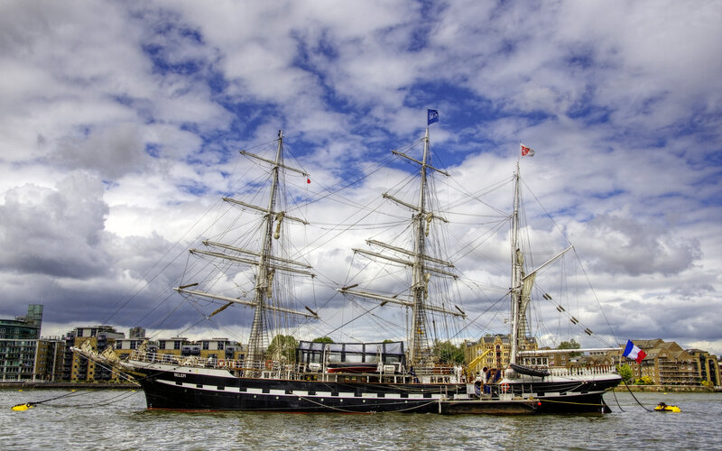 Sailboat on River — Blue
