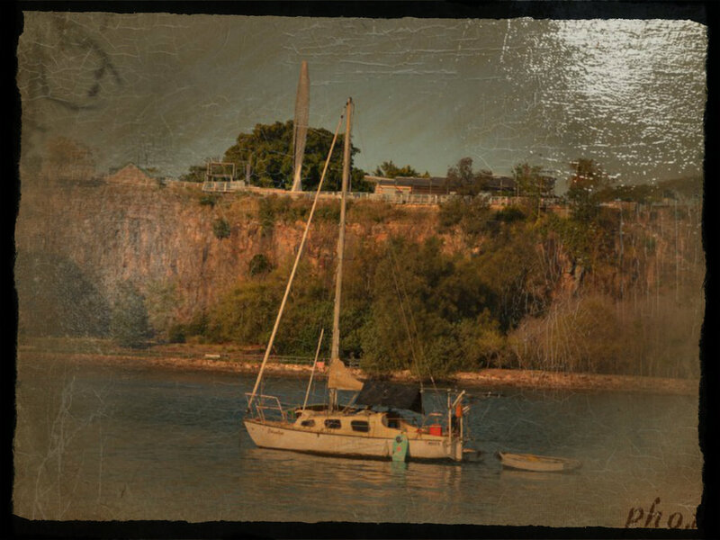Sailboat on River — Brown, Serene