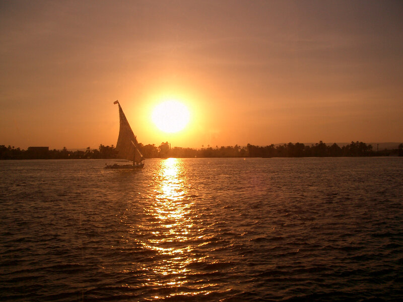 Sailboat on River — Orange